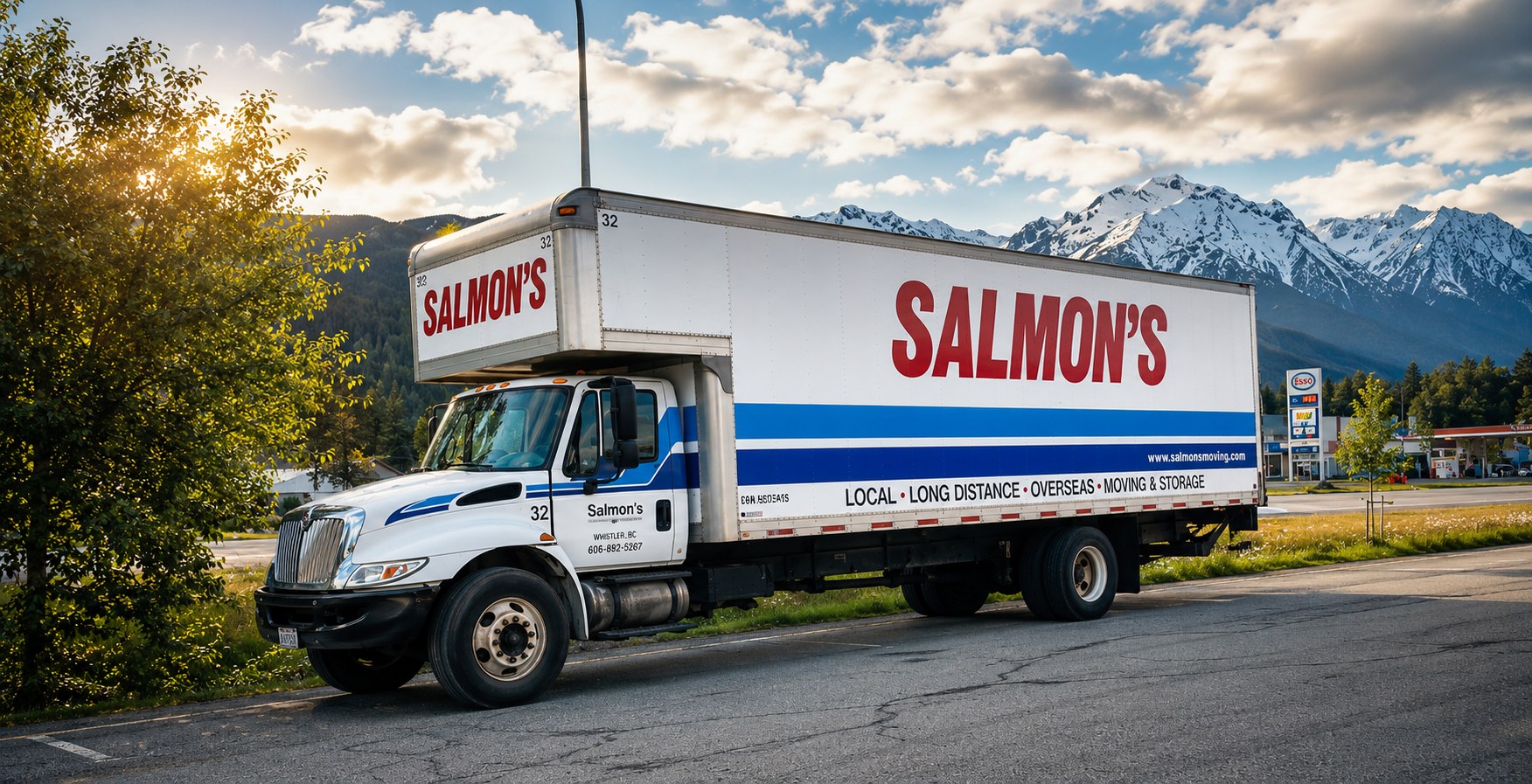 Salmon's Moving & Storage box truck parked with mountains behind it, serving New Westminster and beyond